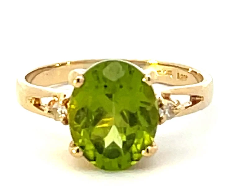 Oval Peridot and Diamond Ring in 14k Yellow Gold