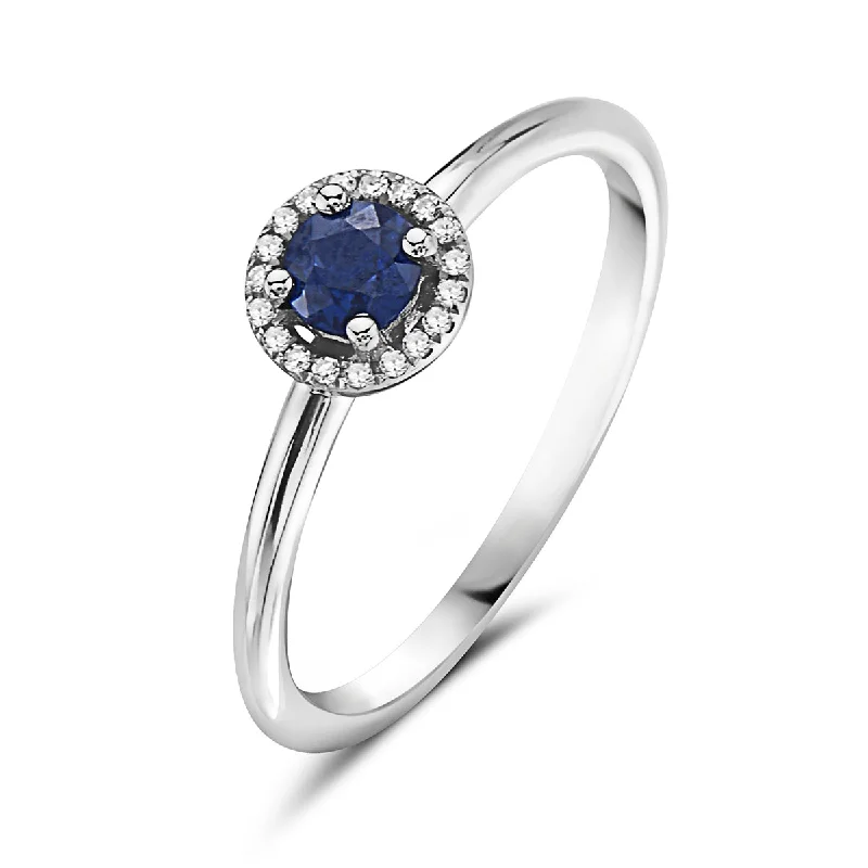 women’s handmade rings-Sapphire And Diamond Halo Ring