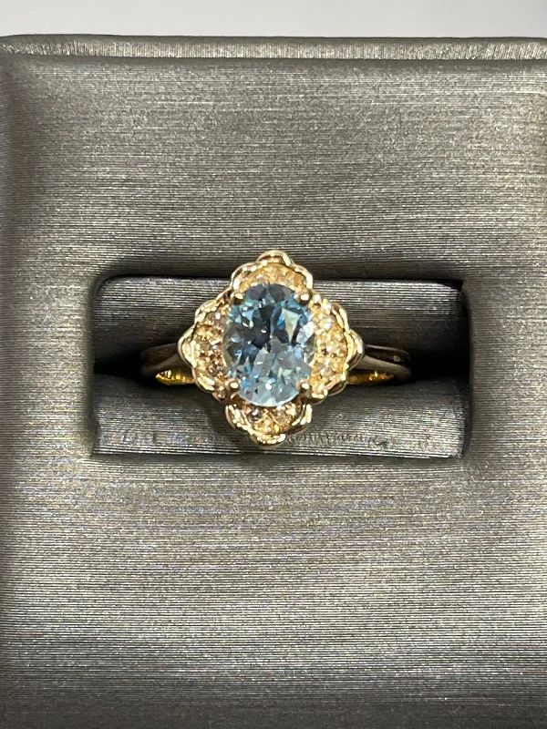 14 Karat Yellow Gold Oval Aquamarine & Diamond Ring