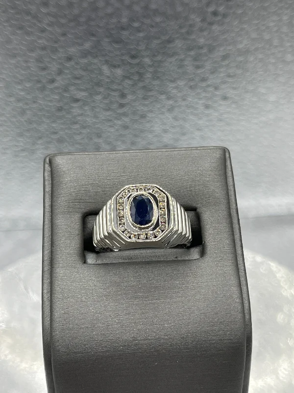 A 14 Karat White Gold Sapphire & Diamond Ring