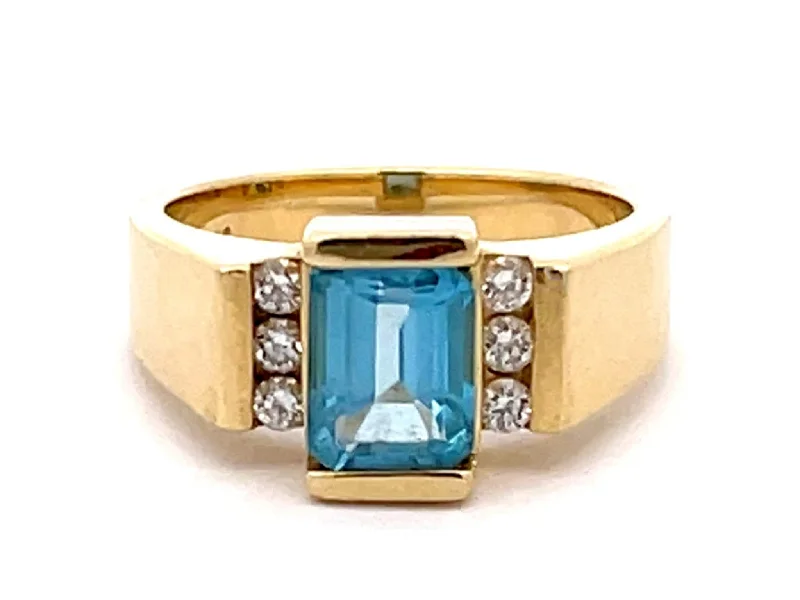 Light Blue Topaz and Diamond Ring in 14k Yellow Gold