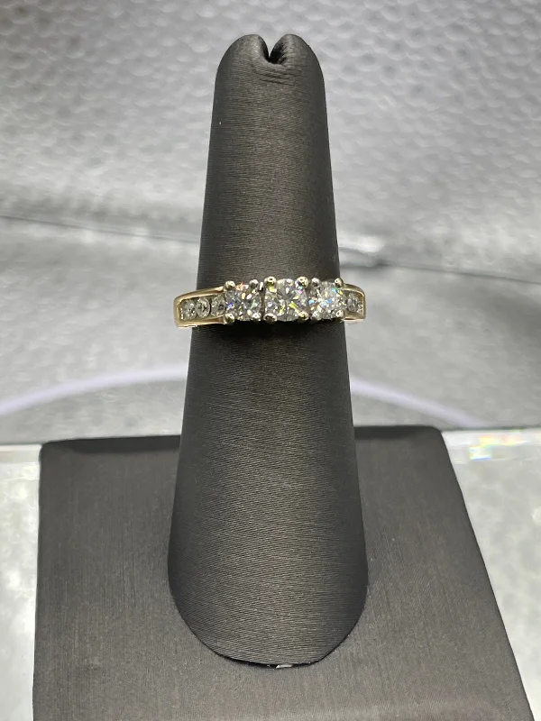 A Magnificent Ladies 14 Karat Yellow Gold 3 Diamond Ring