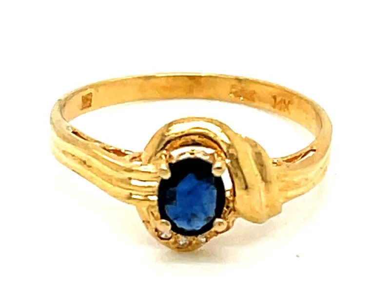 Oval Sapphire Diamond Ring in 14k Yellow Gold