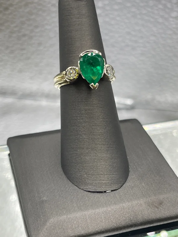 Ladies 14 Karat Yellow Gold Columbian Pear Shaped Emerald and Diamond Ring